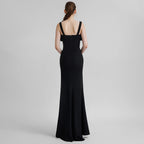 Long black dress with studded bow