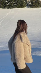 Manteau en fausse fourrure